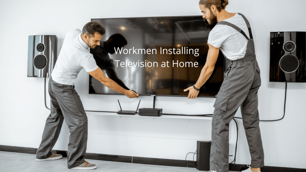 Workmen Installing Television at Home
