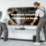 Workmen Installing Television at Home